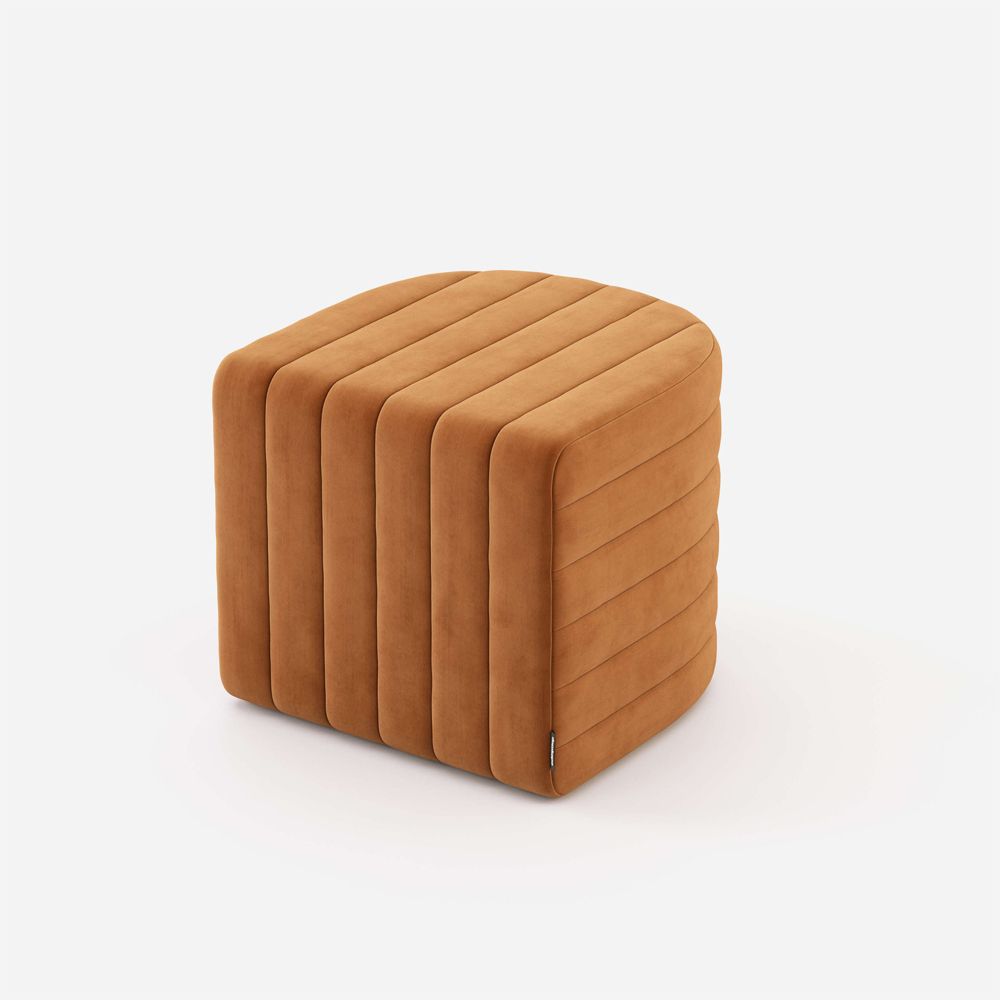 Luxury velvet pouffe with padded, ribbed design