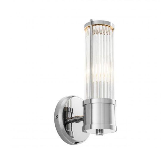 A gorgeous wall lamp with a  finish and clear reeded glass