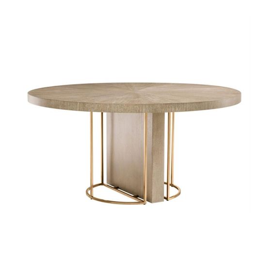 Light brown washed oak circular dining table with brass legs