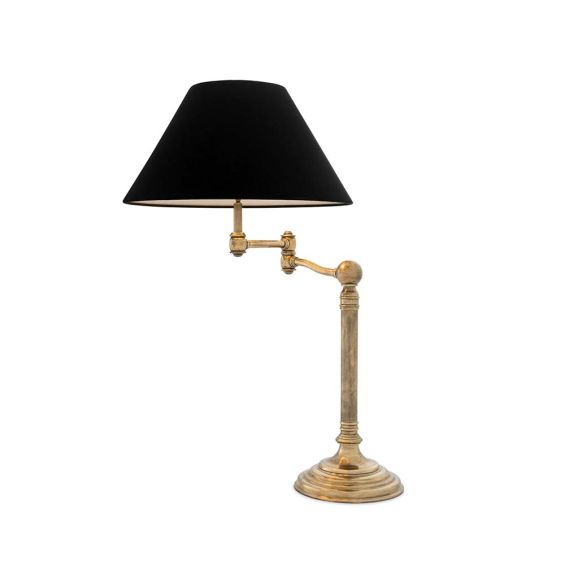 a gorgeous art deco inspired table light with a brass finish and a black velvet shade