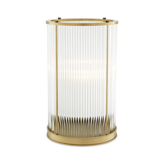 A glamorous hurricane by Eichholtz featuring glass rods and an antique brass finish 