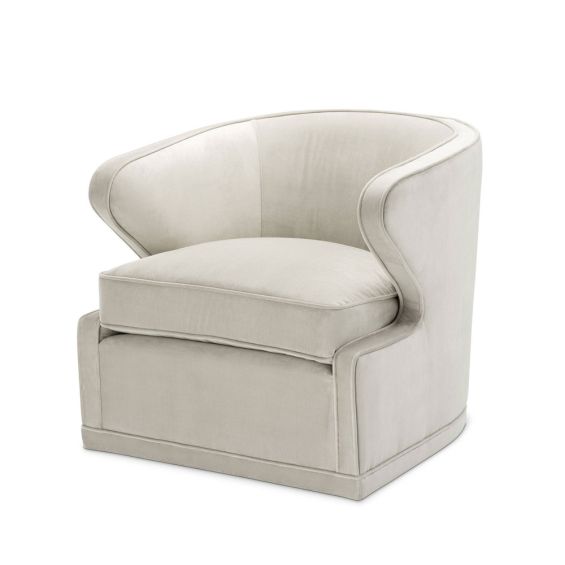 A stunning retro upholstered armchair with a swivel base