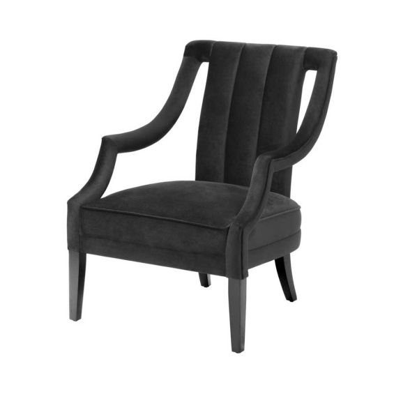 Luxury black velvet armchair with unique cut out design