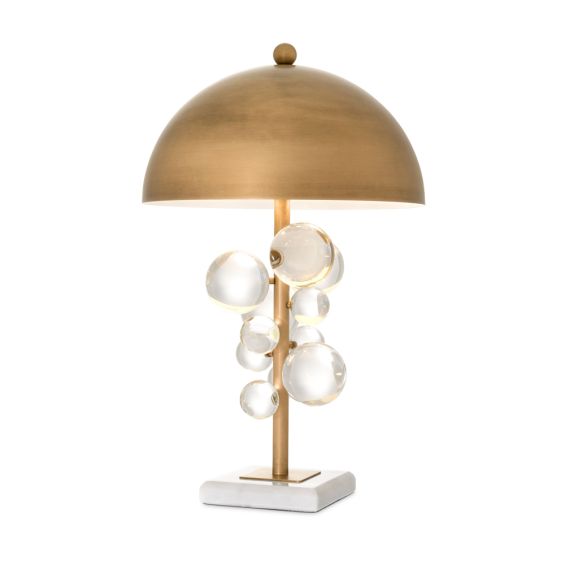 Eichholtz modern retro golden table lamp with clear glass and marble