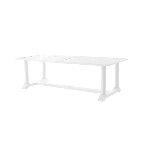 a large rectangular outdoor dining table in white 
