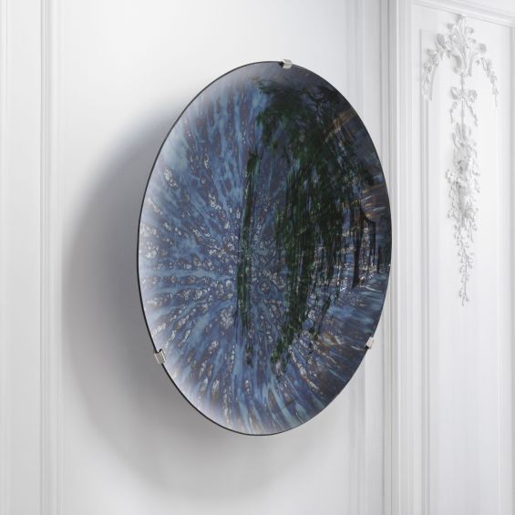 Concave blue mirrored glass decorative wall object