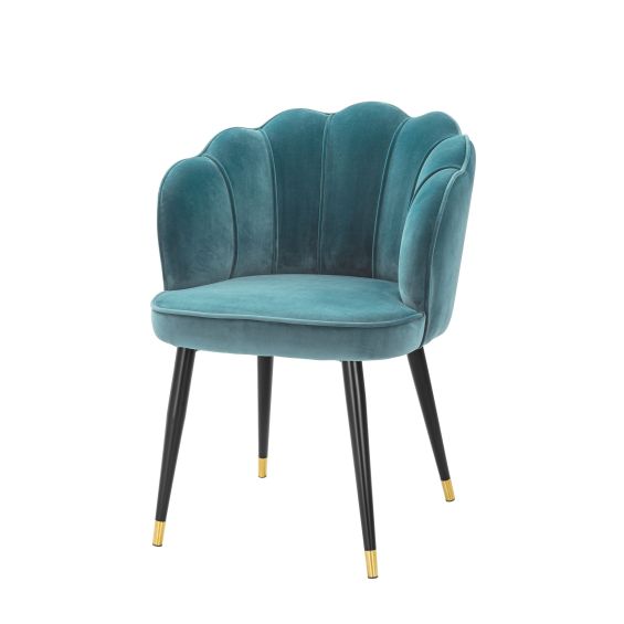 turquoise clamshell-shaped with black tapered legs with gold accents 