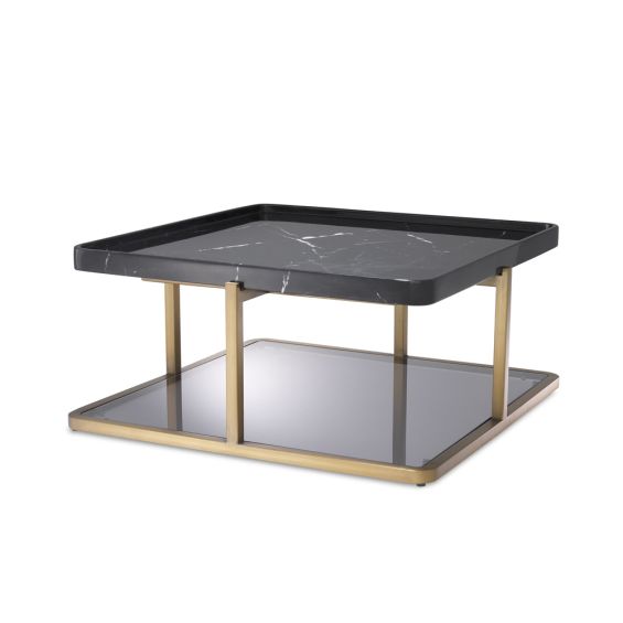 A stylish brushed brass, black marble and smoked glass coffee table