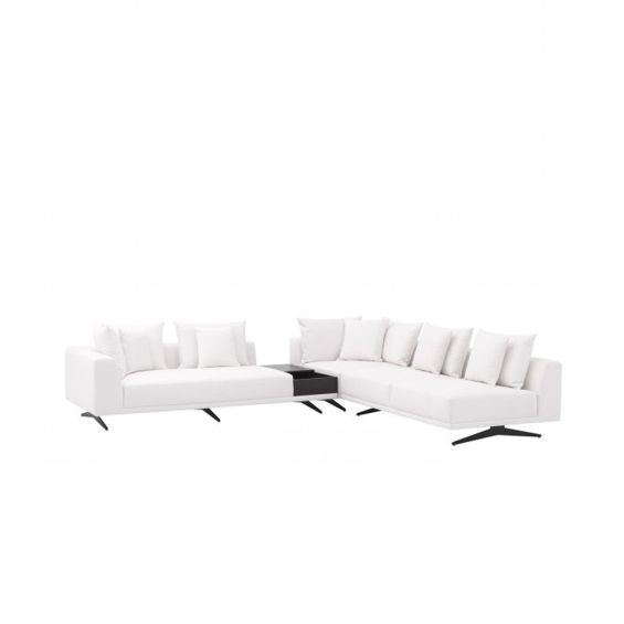 A luxurious upholstered corner sofa with contrasting black legs
