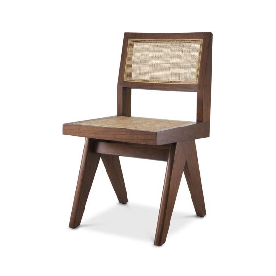 A stunning sculptural rattan dining chair in a natural brown finish