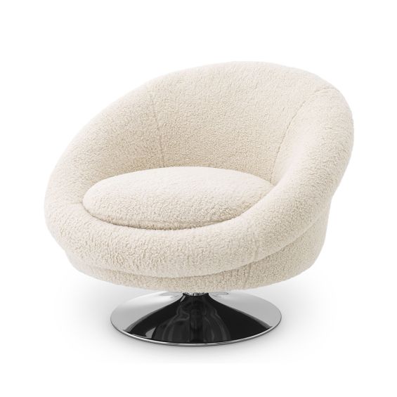 A luxurious chair with Brisbane cream upholstery and a nickel swivel base