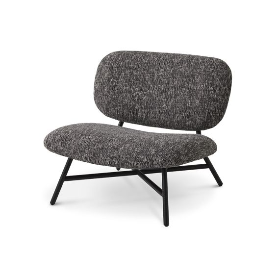 A retro inspired chair Eichholtz with a stylish Cambon Black upholstery 