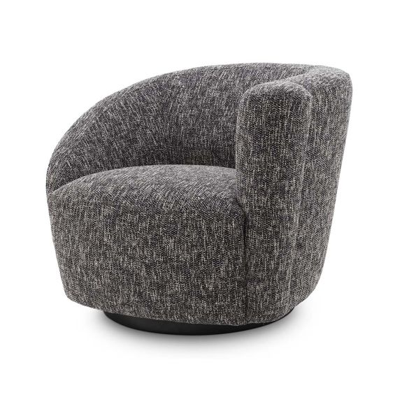A moody and asymmetrical, right-facing swivel chair in a Cambon Black finish.