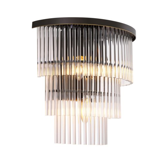 A contemporary ribbed glass and bronze metal wall lamp