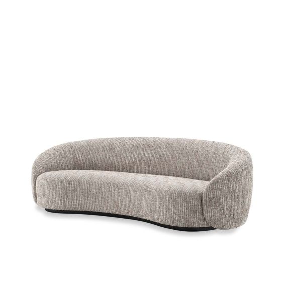 Curved sofa upholstered in a beige fabric.