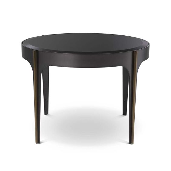 A gorgeous dark side table with a bevelled glass top with bronze and brass elements