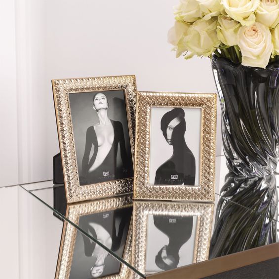 A glamorous set of 6 rose gold photo frames by Eichholtz 
