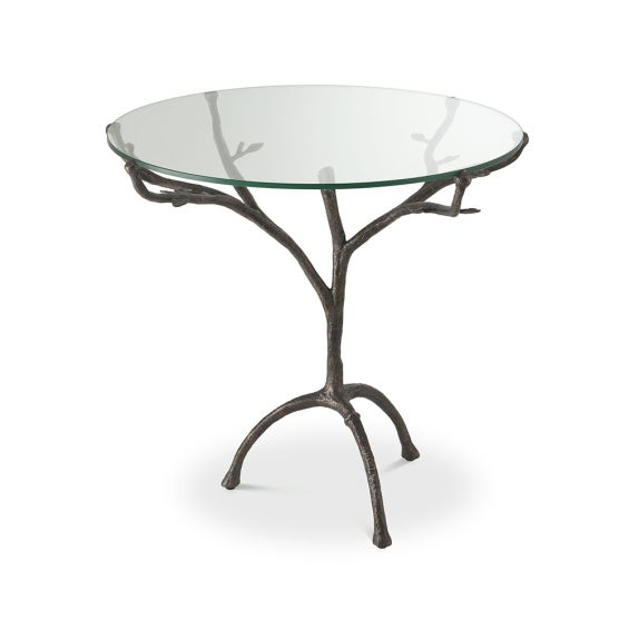 A unique and stylish centre table by Eichholtz with a clear, round table top and a bronze finished, branch-like tripod base