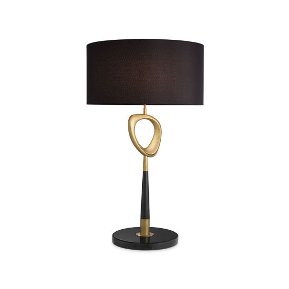 A contemporary table lamp by Eichholtz with a stylish design featuring an antique brass finish, an open free shape and a black cylindrical shade