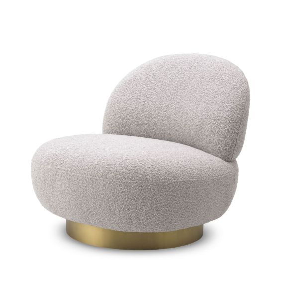 Curvaceous grey boucle swivel chair with brushed brass base
