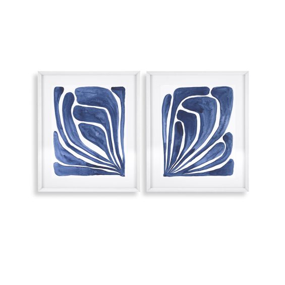 A set of two beautiful, blue tropical leaf prints with a sleek, white wooden frame 