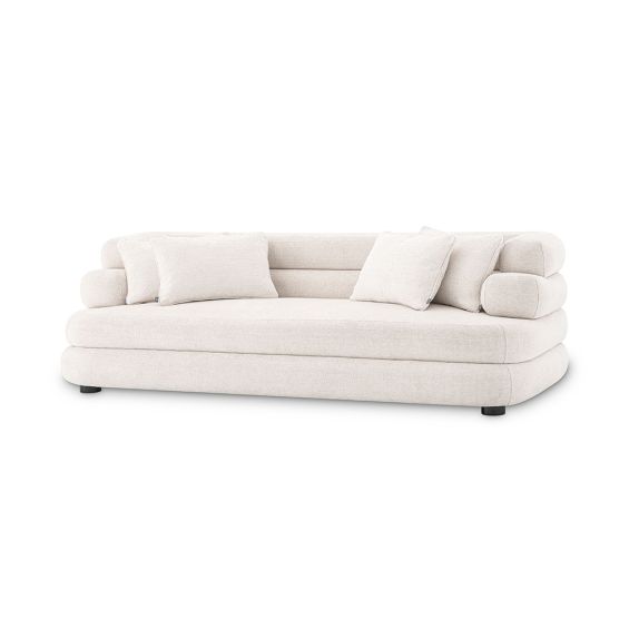 A contemporary and curvaceous sofa by Eichholtz with a luxury Lyssa Off-White upholstery