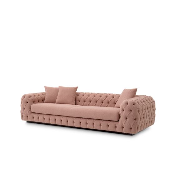 Luxurious pink sofa with classic style deep buttoning