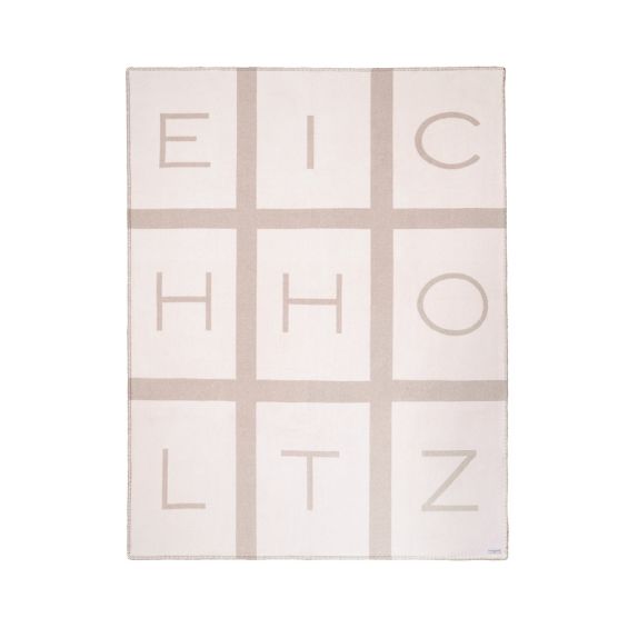 Greige and cream cashmere and wool throw with Eichholtz branding