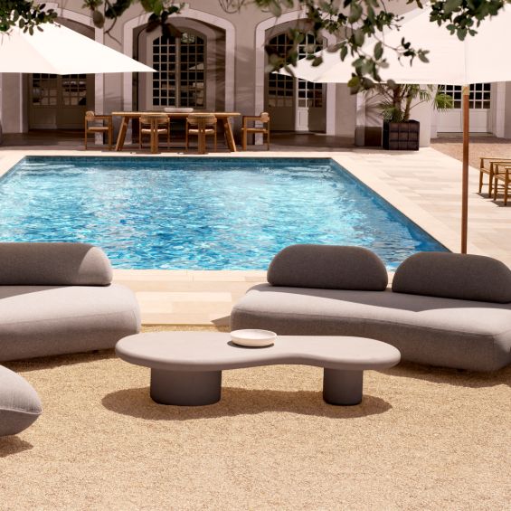 Contemporary and curvaceous outdoor coffee table 