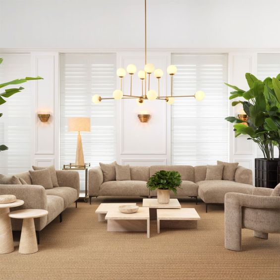 A luxury lounge sofa by Eichholtz with a Lyssa Sand finish 
