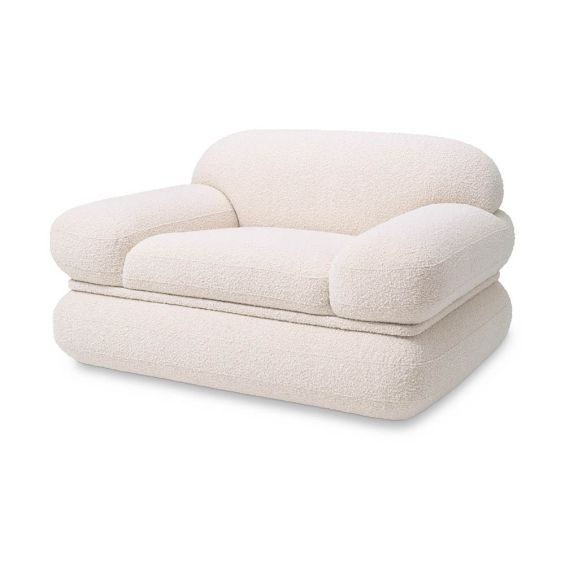 Plush, cloud-like armchair in boucle cream finish