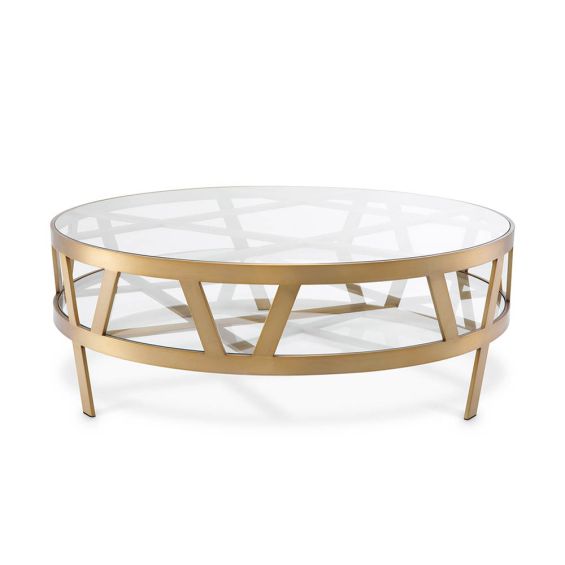 Circular coffee table with geometric brass legs and glass top