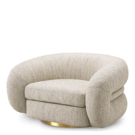 A luxury chair by Eichholtz with a gorgeous grey upholstery and brass plinth