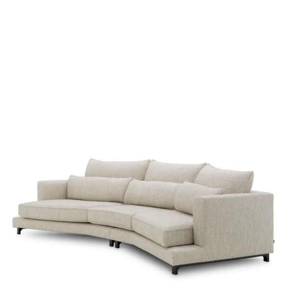 A luxury sofa by Eichholtz with a grey upholstery and modern design