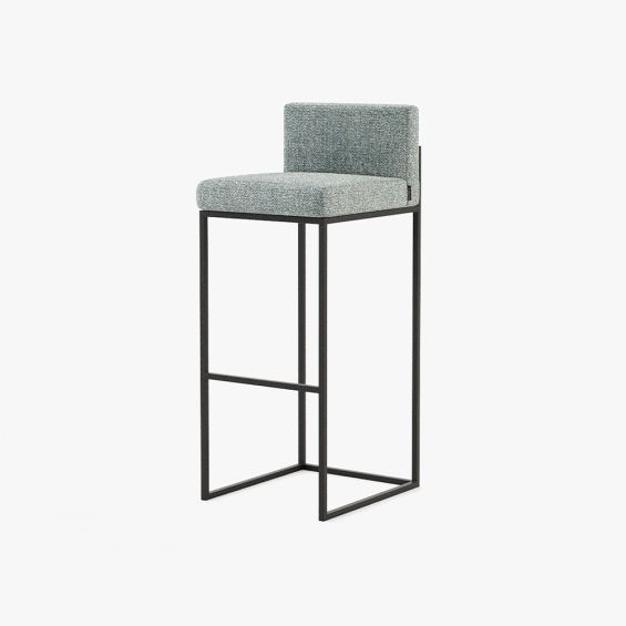 A luxurious tall bar stool in Lars Atlantic with an iron base