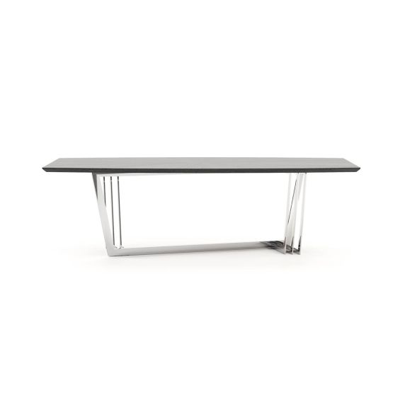 A chic dining table with a z-shaped base and a grey eucalyptus table top and stainless steel base