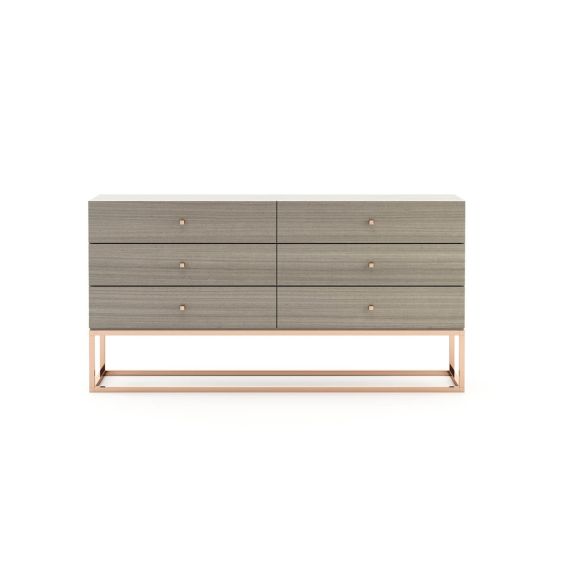 A modern chic 6-drawer chest of drawers in a aged oak finish with a gold base and handles
