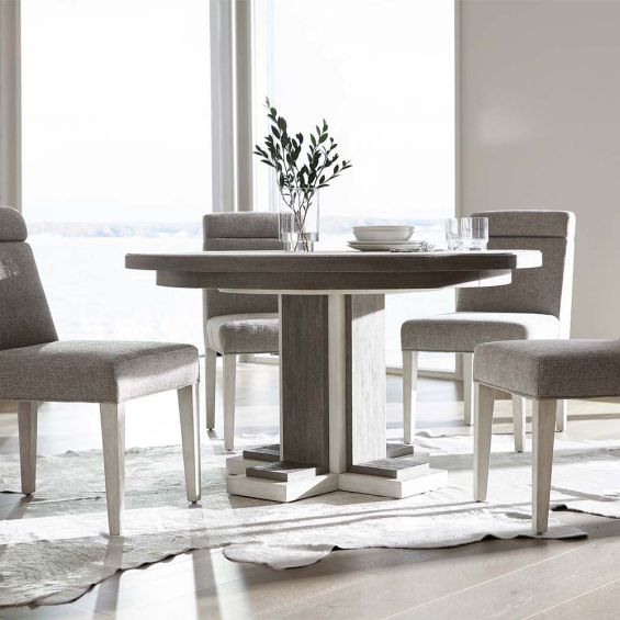 Circular dining table with two toned wood