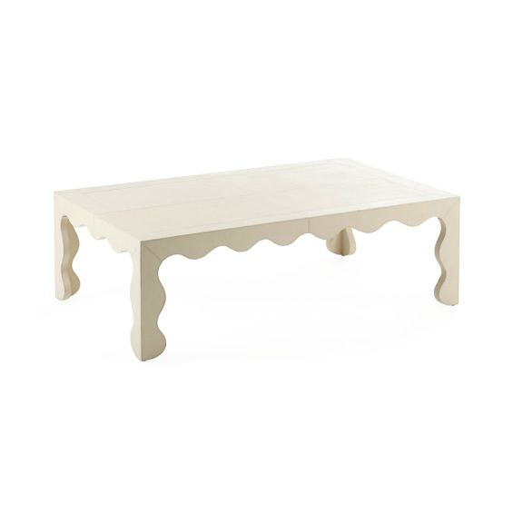 Enchanting coffee table in Bone finish with wave shape accent