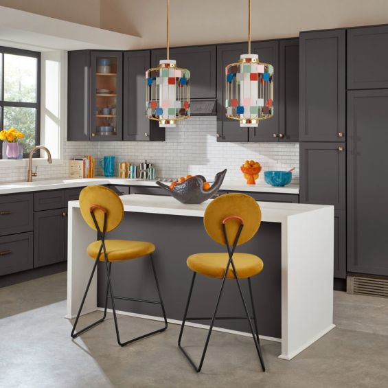 Chic counter stool in vibrant yellow finish with black metal frame