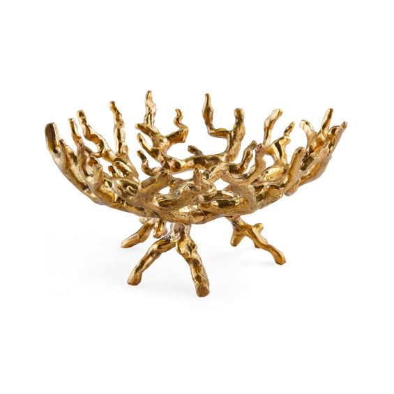 A luxury brass bowl by Jonathan Adler with a chic coral design 