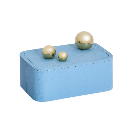 Blue leather storage box with golden orb handle detail