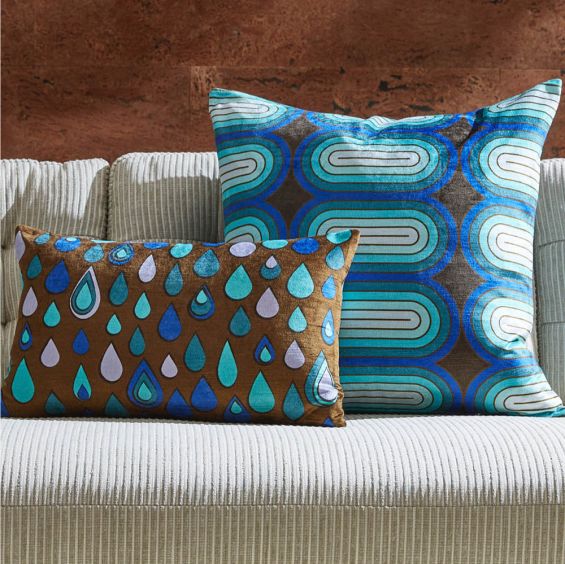 Mesmerising capsule pattern cushion in varying blue tones