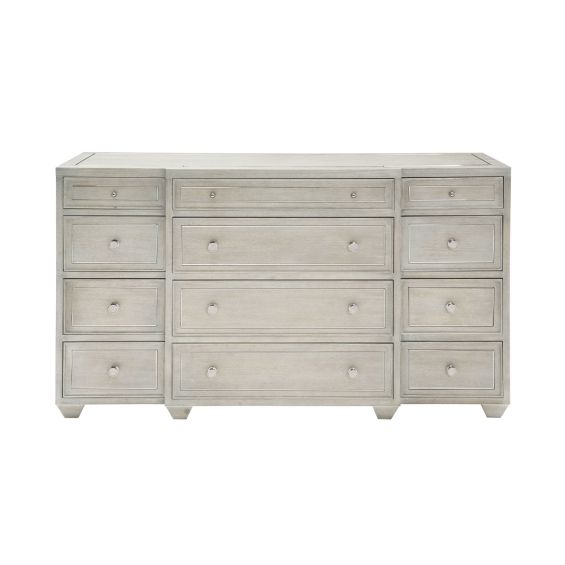 A gorgeous dresser from Bernhardt with an ash veneer finish, stainless steel metal inlay and twelve drawers