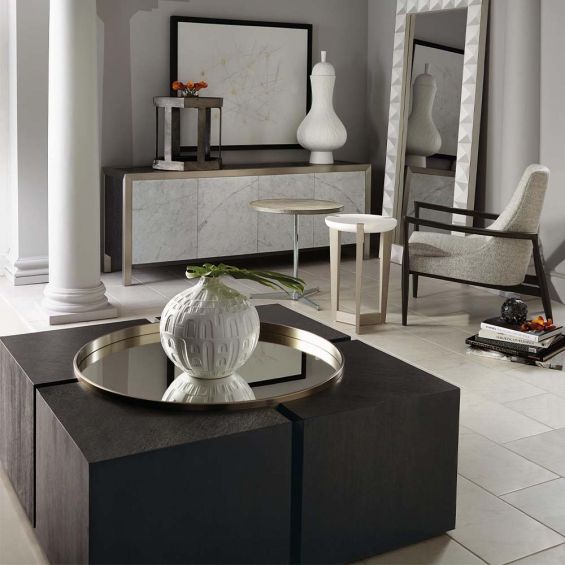 An abstract coffee table with a mirrored top