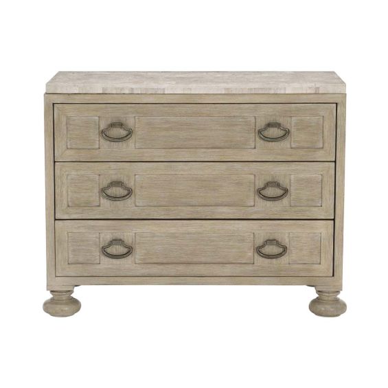 A rustic bedside table with a stone top.