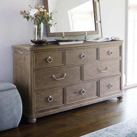 Subtle 8-drawer dresser in a light, natural wood finish