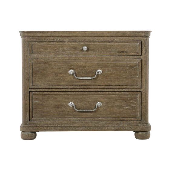 A peppercorn finished bedside table with 3 drawers