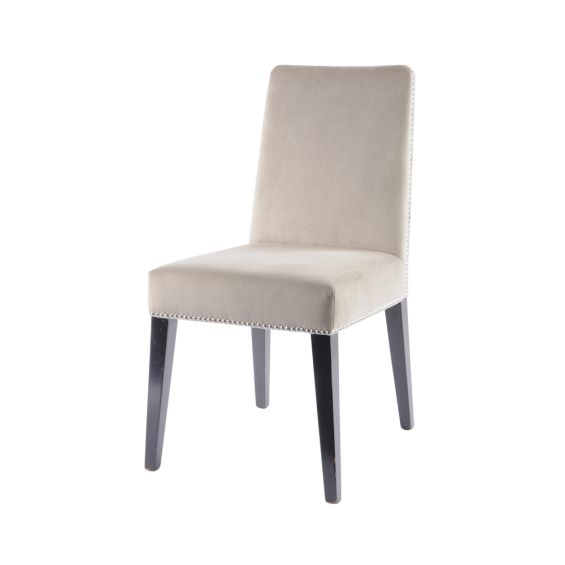 taupe velvet dining chair with silver details and dark brown legs 