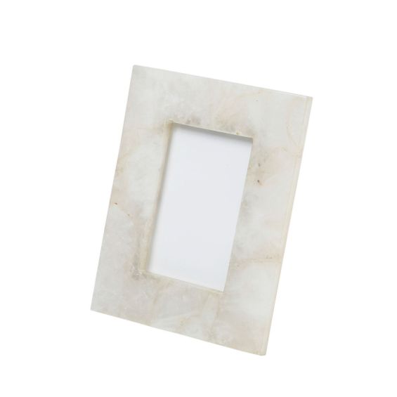 A stylish small white quartz picture frame